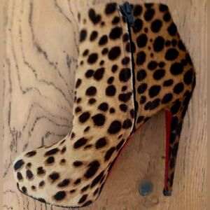 Christian Louboutin cheetah print calf hair boots
-size 37 EU